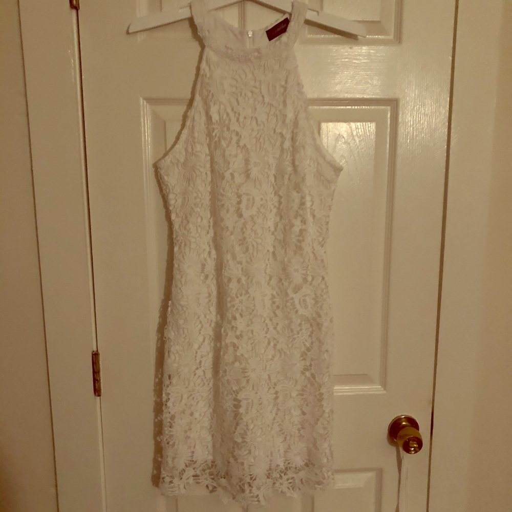 Sleeveless white lace dress